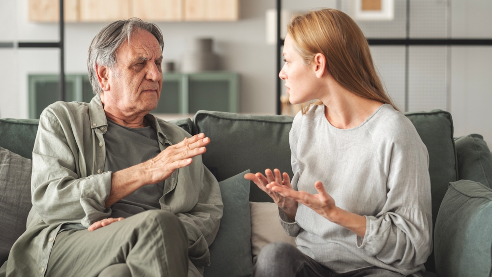 Parent and adult child fighting in an article by katie walker on how to handle no contact